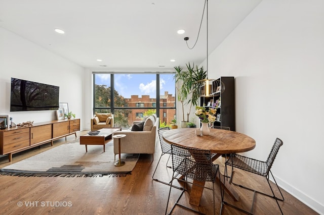2125 N Mozart St Unit 3, Chicago, IL 60647 - dining area featuring wood finished floors, recessed lighting, and floor to ceiling windows