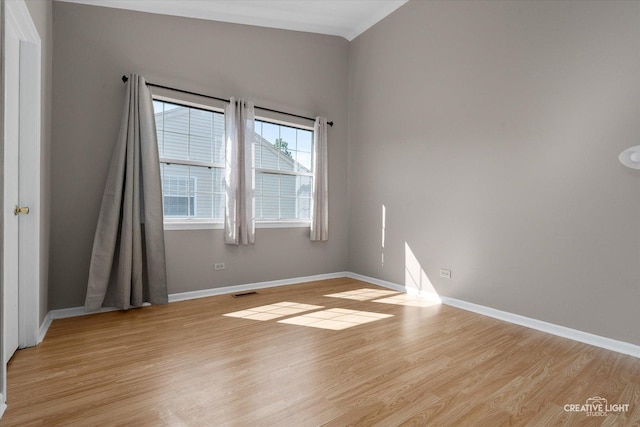61 King Dr, Streamwood, IL 60107 - unfurnished room with light wood finished floors