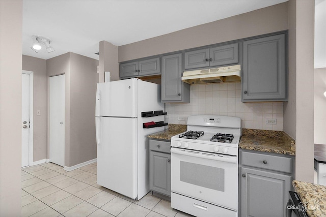 61 King Dr, Streamwood, IL 60107 - kitchen featuring white appliances, under cabinet range hood, gray cabinets, and tasteful backsplash