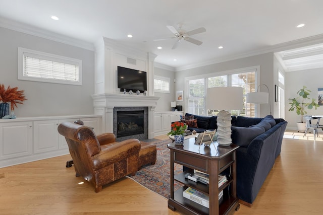 700 E Sunnyside Ave, Libertyville, IL 60048 - living area featuring a ceiling fan, light wood finished floors, ornamental molding, a fireplace, and recessed lighting