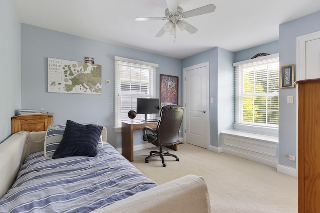 700 E Sunnyside Ave, Libertyville, IL 60048 - bedroom featuring multiple windows, light colored carpet, and ceiling fan