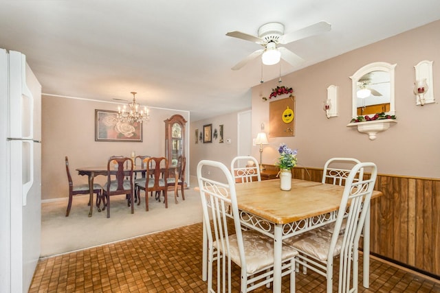 456 W Stanton Ln, Crete, IL 60417 - dining room with a chandelier, a ceiling fan, and carpet floors