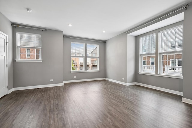 10606 Paige Ct, Orland Park, IL 60462 - unfurnished room with dark wood-type flooring, recessed lighting, and a smoke detector