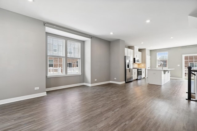 10606 Paige Ct, Orland Park, IL 60462 - unfurnished living room with dark wood finished floors and recessed lighting