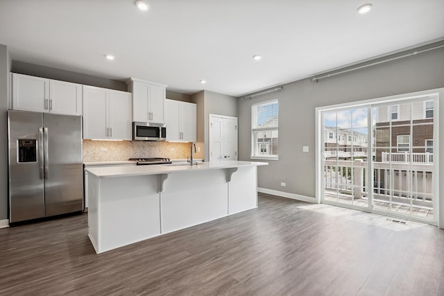 10606 Paige Ct, Orland Park, IL 60462 - kitchen with stainless steel appliances, dark wood-style floors, tasteful backsplash, and recessed lighting