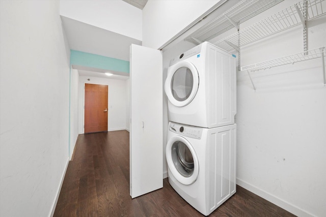 235 W Van Buren St Unit 1720, Chicago, IL 60607 - laundry room with stacked washer and clothes dryer and dark wood-style flooring