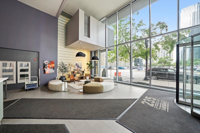 235 W Van Buren St Unit 1720, Chicago, IL 60607 - lobby featuring a high ceiling and a wall of windows
