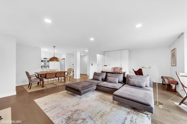 300 Thames Pkwy Unit 2A, Park Ridge, IL 60068 - living area with recessed lighting and light wood-type flooring