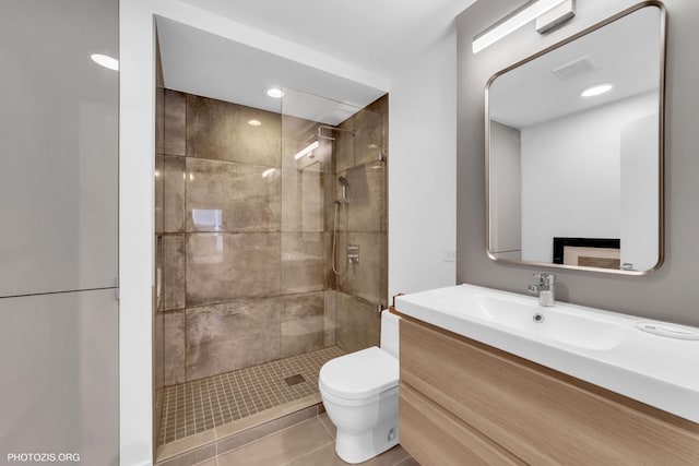 300 Thames Pkwy Unit 2A, Park Ridge, IL 60068 - bathroom with a shower stall, vanity, and tile patterned flooring