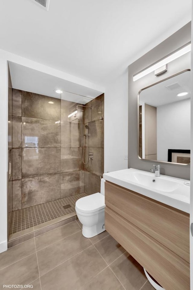 300 Thames Pkwy Unit 2A, Park Ridge, IL 60068 - full bathroom with vanity, tile patterned floors, and tiled shower