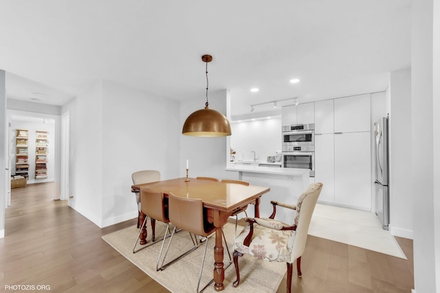 300 Thames Pkwy Unit 2A, Park Ridge, IL 60068 - dining room featuring light wood-style flooring and recessed lighting