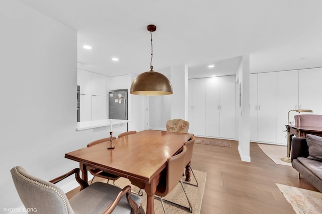 300 Thames Pkwy Unit 2A, Park Ridge, IL 60068 - dining room featuring light wood finished floors and recessed lighting