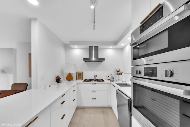 300 Thames Pkwy Unit 2A, Park Ridge, IL 60068 - kitchen with wall chimney exhaust hood, modern cabinets, appliances with stainless steel finishes, light countertops, and light tile patterned flooring
