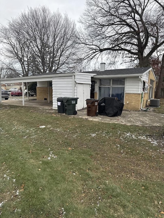 17222 Country Ln, Hazel Crest, IL 60429 - view of property exterior with brick siding, a chimney, a carport, and a lawn