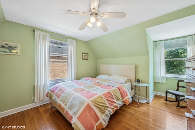 530 S Vail Ave, Arlington Heights, IL 60005 - bedroom with vaulted ceiling, multiple windows, wood finished floors, and ceiling fan