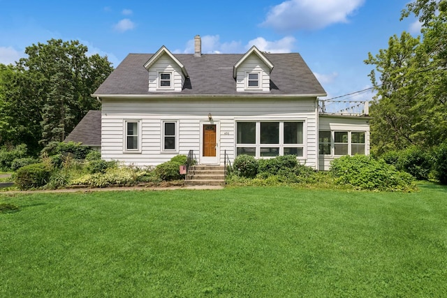 456 Grove St, Wood Dale, IL 60191 - new england style home featuring a front yard, a chimney, and a shingled roof