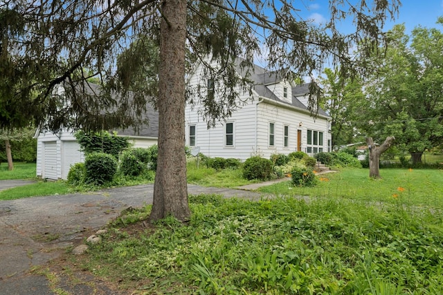 456 Grove St, Wood Dale, IL 60191 - view of property exterior with driveway and a garage