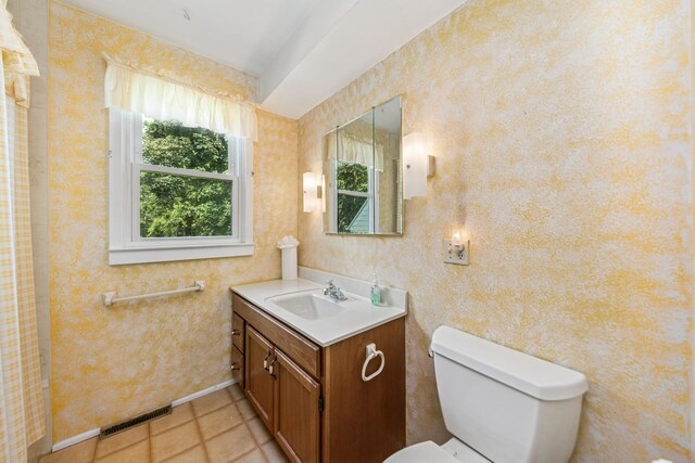 456 Grove St, Wood Dale, IL 60191 - bathroom featuring vanity and tile patterned flooring