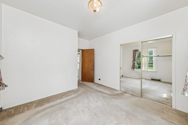 456 Grove St, Wood Dale, IL 60191 - unfurnished bedroom featuring carpet flooring and a closet