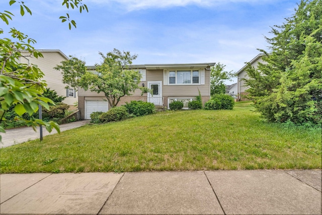 9113 Sycamore Dr, Hickory Hills, IL 60457 - raised ranch with a front yard, a garage, and driveway