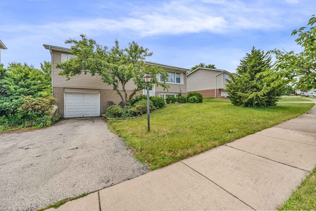 9113 Sycamore Dr, Hickory Hills, IL 60457 - bi-level home featuring brick siding, a front lawn, a garage, and driveway