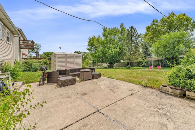9113 Sycamore Dr, Hickory Hills, IL 60457 - fenced backyard featuring a playground, a patio area, and an outdoor living space