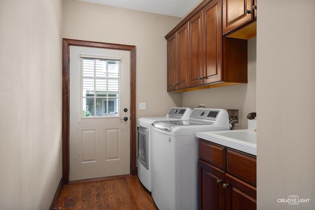 1105 Thoroughbred Cir, Saint Charles, IL 60174 - washroom with cabinet space, washing machine and clothes dryer, and dark wood-type flooring