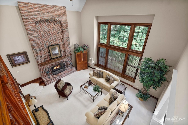 1105 Thoroughbred Cir, Saint Charles, IL 60174 - living room with a brick fireplace, carpet flooring, and lofted ceiling