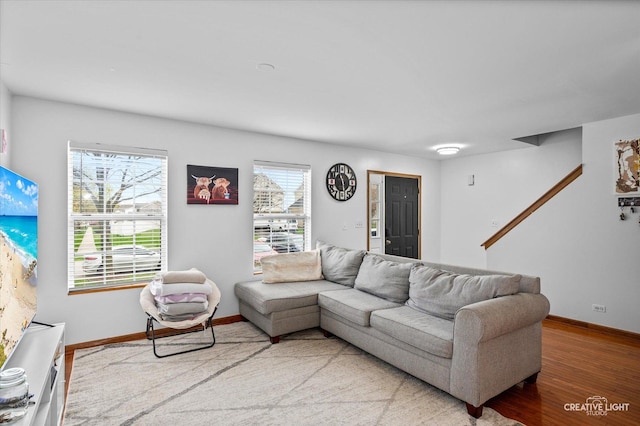 220 Braemar Gln, Bolingbrook, IL 60440 - living room featuring baseboards and light wood-style flooring