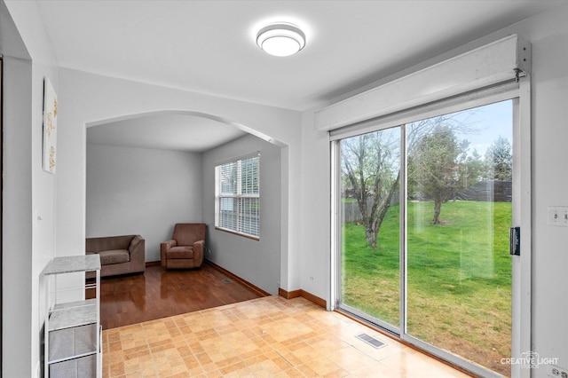 220 Braemar Gln, Bolingbrook, IL 60440 - unfurnished room featuring arched walkways and baseboards