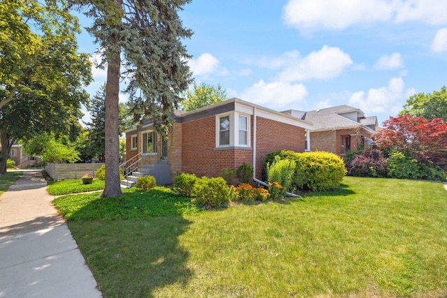 6037 N Nagle Ave, Chicago, IL 60646 - view of side of home featuring brick siding and a lawn