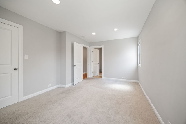 6037 N Nagle Ave, Chicago, IL 60646 - unfurnished bedroom featuring recessed lighting and light colored carpet