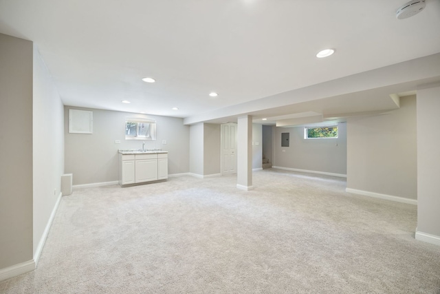 6037 N Nagle Ave, Chicago, IL 60646 - below grade area featuring recessed lighting, light colored carpet, bar, and electric panel