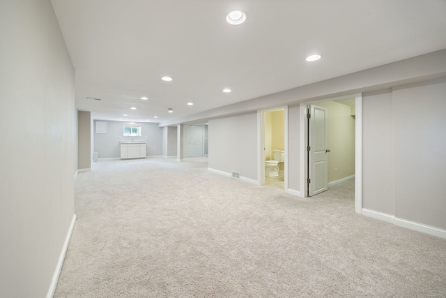6037 N Nagle Ave, Chicago, IL 60646 - below grade area featuring recessed lighting and light colored carpet