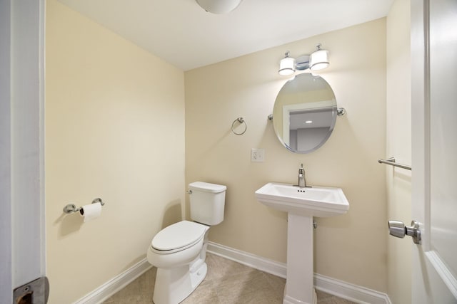 6037 N Nagle Ave, Chicago, IL 60646 - half bath with toilet and tile patterned floors