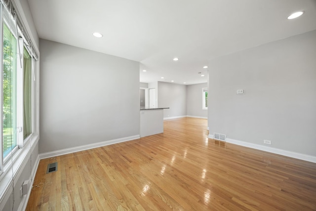 6037 N Nagle Ave, Chicago, IL 60646 - empty room featuring light wood-style flooring and recessed lighting