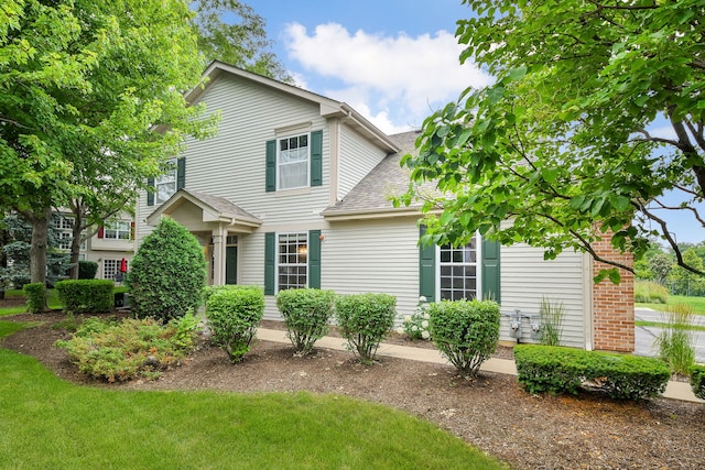 838 Stuarts Dr, Saint Charles, IL 60174 - view of front facade featuring a shingled roof