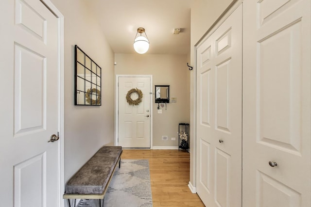 1601 N Paulina St Unit 2D, Chicago, IL 60622 - entryway featuring light wood-style flooring and baseboards