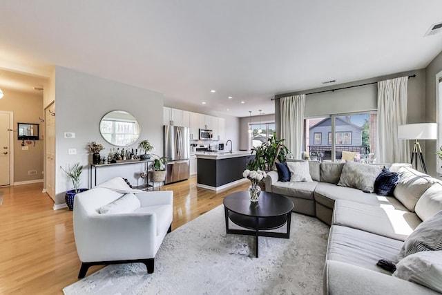 1601 N Paulina St Unit 2D, Chicago, IL 60622 - living room featuring light wood-type flooring and recessed lighting