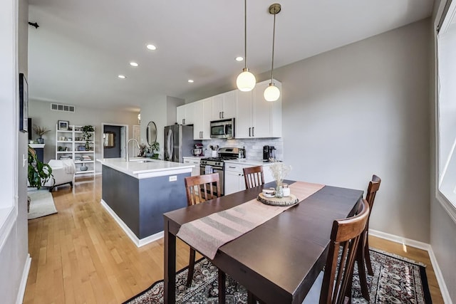 1601 N Paulina St Unit 2D, Chicago, IL 60622 - dining room featuring light wood-type flooring and recessed lighting