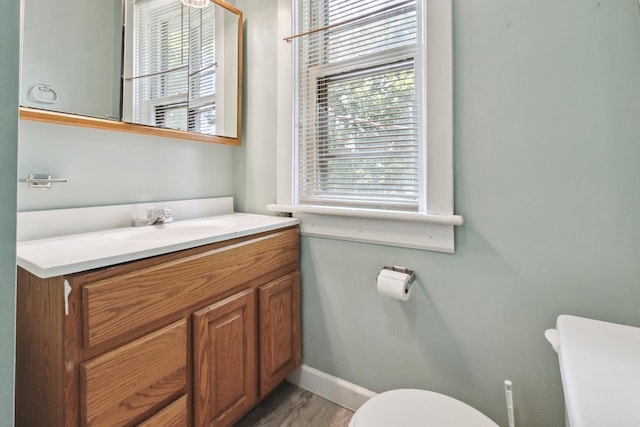 809 W 4th St, Sterling, IL 61081 - half bath featuring toilet and vanity