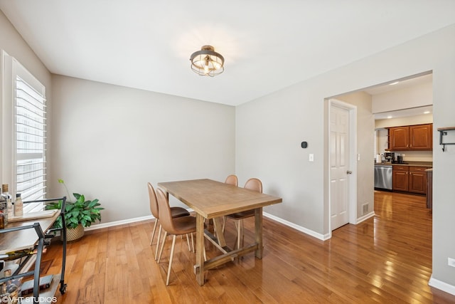 1460 Canter Ln, Bartlett, IL 60103 - dining room featuring baseboards and light wood-style flooring