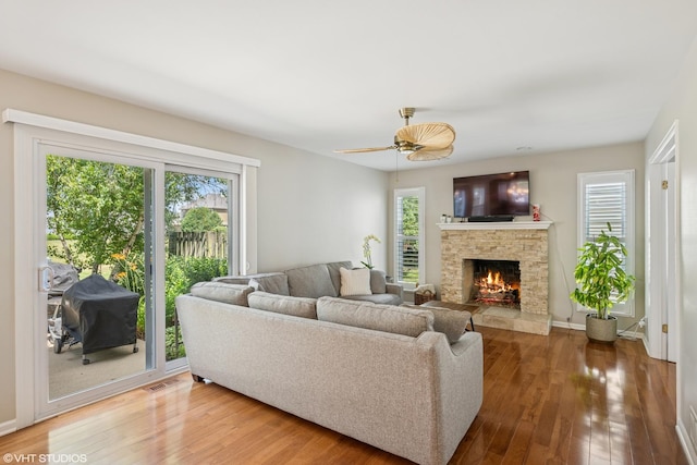 1460 Canter Ln, Bartlett, IL 60103 - living room with hardwood / wood-style flooring, a fireplace, and a ceiling fan