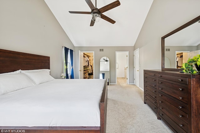 1460 Canter Ln, Bartlett, IL 60103 - bedroom featuring lofted ceiling, light carpet, a walk in closet, a closet, and a ceiling fan