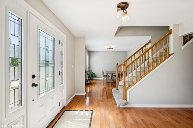 1460 Canter Ln, Bartlett, IL 60103 - entrance foyer with stairway and light wood-style flooring