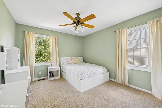 1460 Canter Ln, Bartlett, IL 60103 - carpeted bedroom with baseboards and ceiling fan