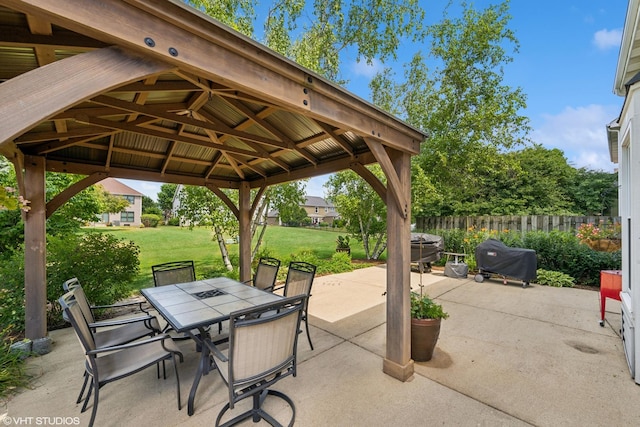 1460 Canter Ln, Bartlett, IL 60103 - view of patio featuring a gazebo, a grill, and outdoor dining space