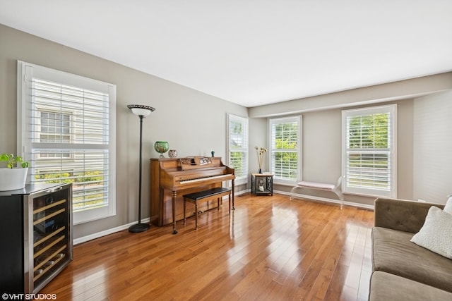 1460 Canter Ln, Bartlett, IL 60103 - sitting room featuring light wood-style floors and wine cooler