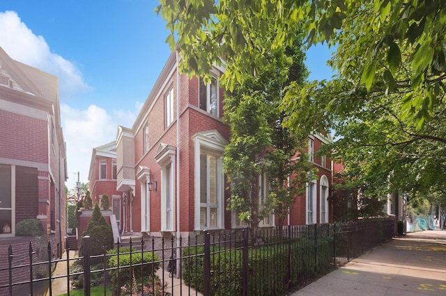 2446 N Janssen Ave, Chicago, IL 60614 - view of building exterior featuring a fenced front yard