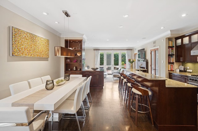 2446 N Janssen Ave, Chicago, IL 60614 - dining room featuring ornamental molding, dark wood finished floors, and recessed lighting